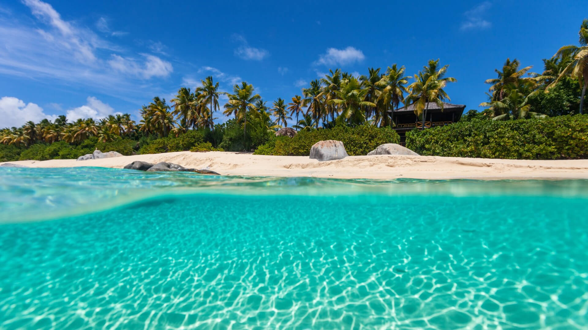 A selection of some of the idyllic destinations you can explore with Tropicalboat, such as the crystal waters of the Bahamas pictured above