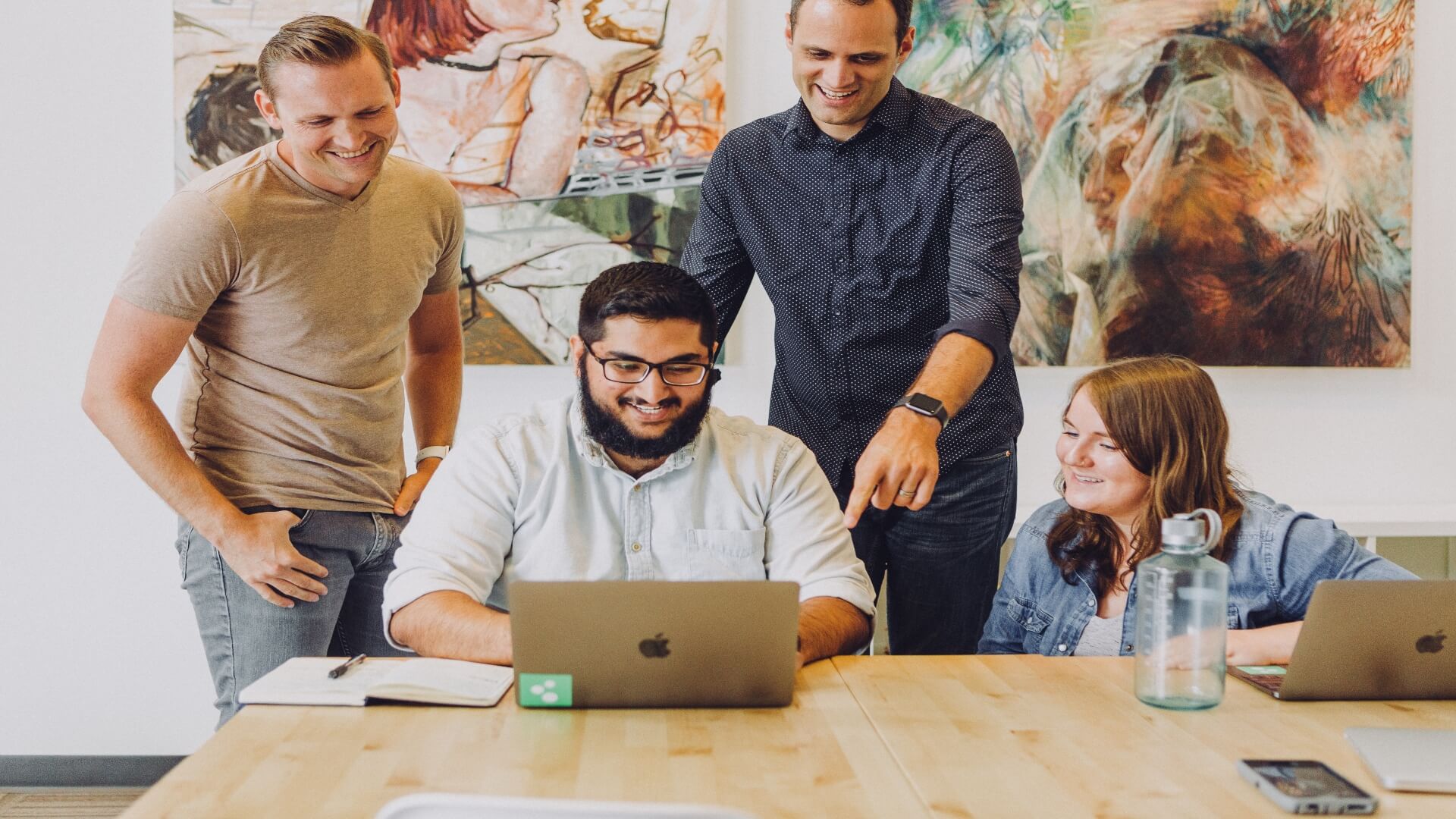 Meeting around laptop